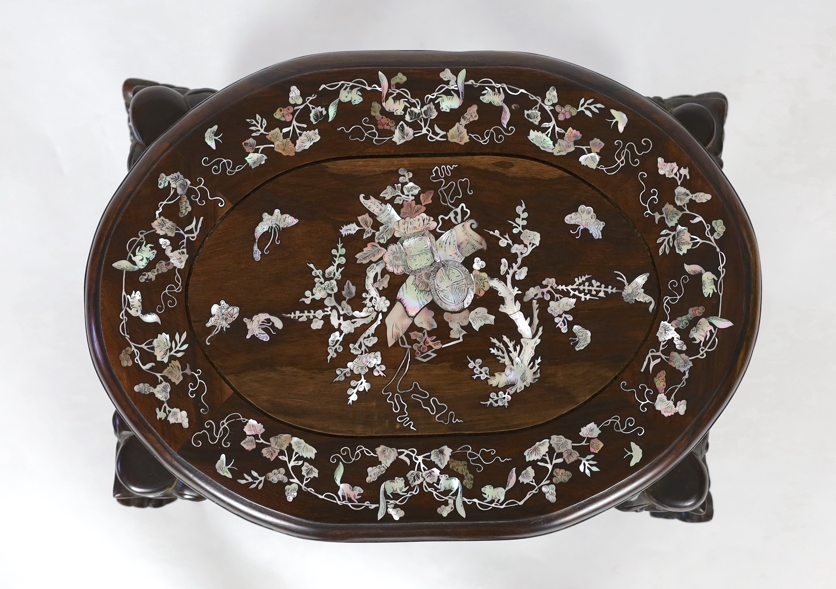 A Chinese hongmu and mother-of-pearl inlaid stool or stand, mid 20th century